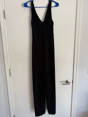 Francesca's Collections Black Lace V-Neck Jumpsuit